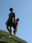 SX07992 Wouko and Kristina walking down cliff.jpg